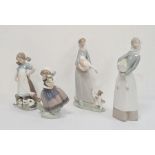 Lladro figure of a girl with kittens, a Lladro figure of a girl with goose and puppy, a Lladro