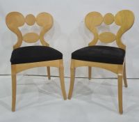 Set of eight Art Deco sycamore? board room chairs with double ogee backs and padded black