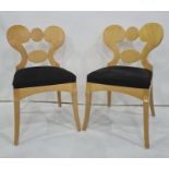 Set of eight Art Deco sycamore? board room chairs with double ogee backs and padded black