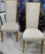 Four modern cream upholstered dining chairs