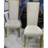 Four modern cream upholstered dining chairs