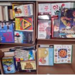 Four boxes of assorted books including fiction, Matt cartoon annuals, recipe books, etc