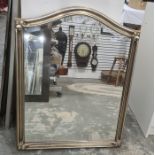 Arched top mirror in silver painted moulded frame, 90.5 x 67cm
