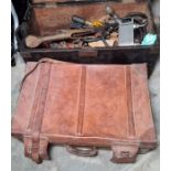 Vintage leather suitcase and a small wooden trunk filled with assorted vintage tools