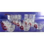 20th century clear glass punchbowl with label, red handled and a set of 12 matching mugs and a clear