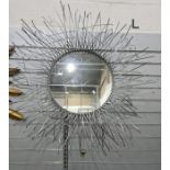 Modern circular mirror in a flexible wire frame, approximately 110cm diameter