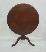 19th century mahogany snap-top circular centre table with moulded edge, turned supports, to three