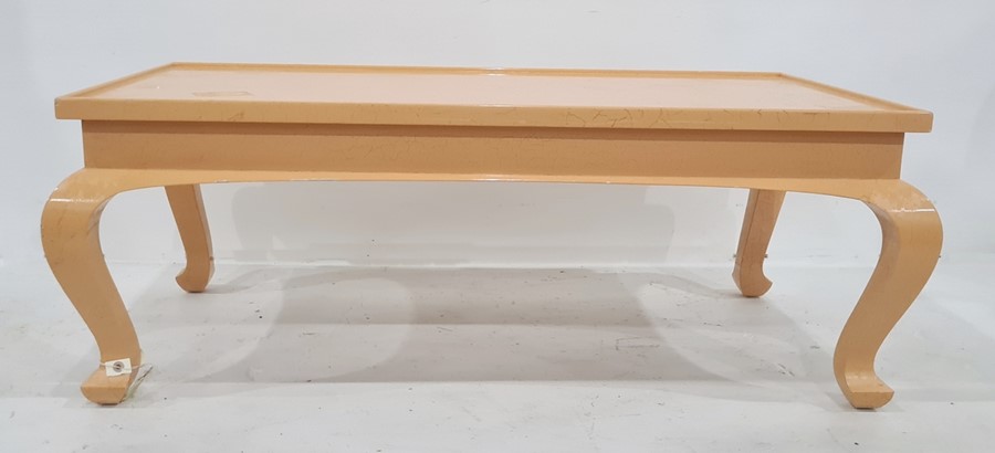 Peach ground rectangular coffee table on cabriole legs, ex Christie's label from 3rd April 2012