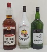 1.5 litre Grosvenor London Dry Gin, 1.5 litre Southern Comfort Whisky liqueur and a 1.5 litre bottle