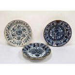 Antique circular blue and white Delft charger, floral decorated (repaired), marked B:P to base, 35cm