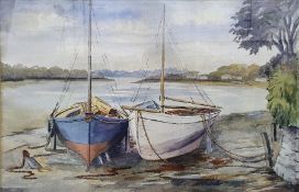 Irene(?) (British, 20th century) Watercolour Two sailing boats on the mud flats, 35cm x 55cm
