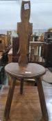 Elm seated low spinning stool with carved and shaped back