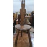 Elm seated low spinning stool with carved and shaped back