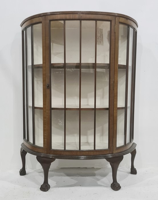 20th century mahogany bowfront display cabinet with single glazed door, raised on cabriole legs to