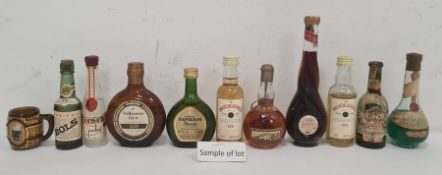 Approximately 30 miniatures of spirits and liqueurs including single malt whiskies, Chartreuse,