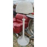 Lloyd loom style standard lamp with white painted loom shade