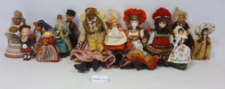 Early to mid 20th century souvenir doll with painted cloth face in traditional costume and various