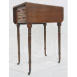 19th century drop-leaf table, the rectangular top with rounded corners, above two drawers, on turned