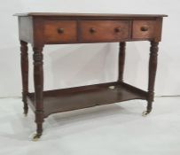 19th century mahogany washstand, the rectangular top with moulded edge above three drawers, on