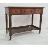 19th century mahogany washstand, the rectangular top with moulded edge above three drawers, on