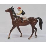 Beswick pottery model of horse with jockey up, 22cm high  Condition ReportOne horse's ear has been