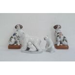 Lladro polar bear, another Lladro polar bear and cub and a pair of Chinese dog book-ends, marked