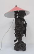 Chinese carved hardwood figure of man with rui sceptre as a table lamp, the figure standing on a