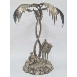 Victorian silver-plated figural centrepiece modelled as a seated figure smoking, with camel under