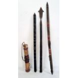 Spear with metal head and chip carved handle, an arrow and two other items