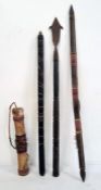 Spear with metal head and chip carved handle, an arrow and two other items