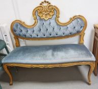 Reproduction French style settee with carved shell motif to the back on cabriole legs