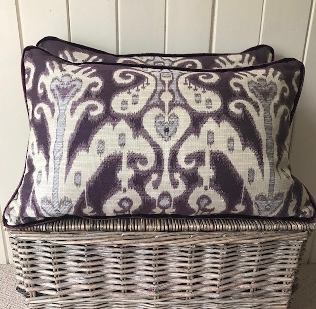 Pair Zoffany Ikat and purple velvet cushions