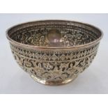 A Victorian silver bowl, repousse decoration, floral and bird decorated, with circular cartouche,
