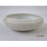 Chinese ivory glazed porcelain brushwasher, circular with incurved rim, crackle glazed base, 14cm