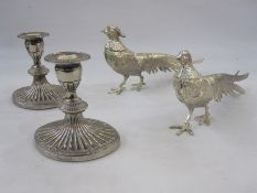 Pair silver plated model pheasants and pair plated candle holders, each oval with gadrooned base (4)
