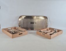 Rectangular two-handled tray with pierced rim and a quantity of silver plated flatware