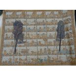 Japanese painted fabric panel with various figures, deities and animals with script, together with a