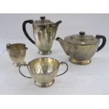 An early 20th century Colonial silver four piece tea/coffee set comprising coffee pot 18toz, 20cm