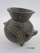 Archaeological find, a small antique black pottery two handled jar with flared rim, the body with
