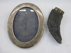 Curled horn snuff mull with metal lid and a silver-coloured oval mounted picture frame, unmarked