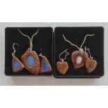 Pair of modern wood and opal pendant earrings, triangular with similar shield-shaped pendant, on