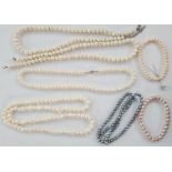 Four white cultured pearl necklaces, various lengths, two pink cultured bracelets and a grey