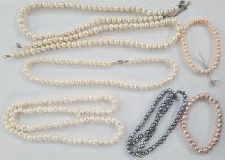 Four white cultured pearl necklaces, various lengths, two pink cultured bracelets and a grey
