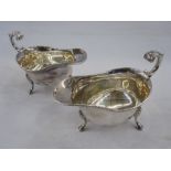 Pair silver sauceboats of revived Georgian style, gadrooned borders and open C-scroll handles,