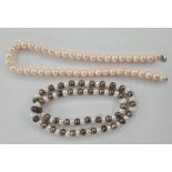 Two cultured pearl necklaces, one white cultured pearl necklace, 45cm long approx, each pearl 8/