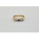 18ct gold, emerald and diamond three-stone ring in modern setting, the shank with bark-finish, maker