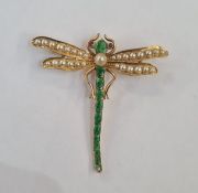 Gold brooch modelled as a dragonfly with enamel body, split pearl wings and ruby eyes, marked 14ct