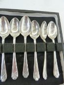 Early 20th century set of six silver teaspoons with golf insignia, Sheffield 1933, Walker & Hall,