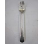 An 18th century silver serving fork, rattail pattern, initialled B, 28.5cm long, 3.5toz approx.