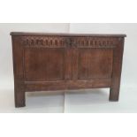 Antique oak coffer having triple-framed panelled top, nulled frieze, double-framed panelled front,